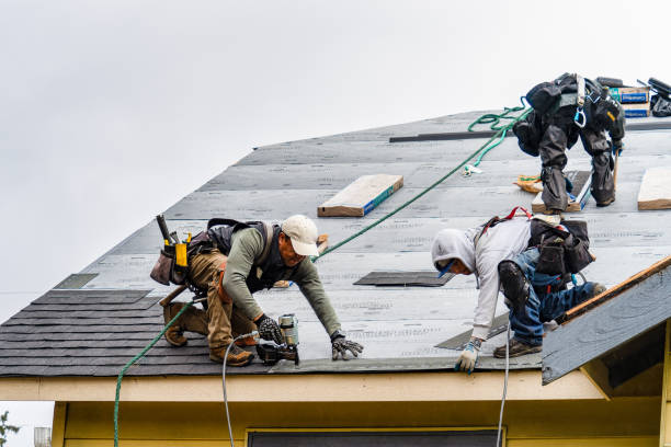 Professional Gutter Installation technician working in Needham Heights, MA